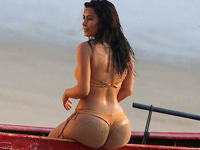 Kim Kardashian boast off her posh booty at the beach 