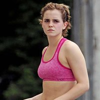 Young Emma Watson in pink sport bra