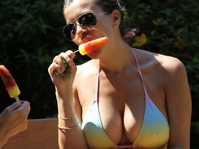 Imogen Thomas sucks an ice-cream