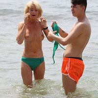 Lauren Harries topless and sexy