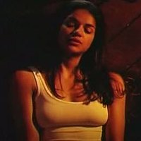 Michelle Rodriguez posing in tight blouse in ‘SWAT’